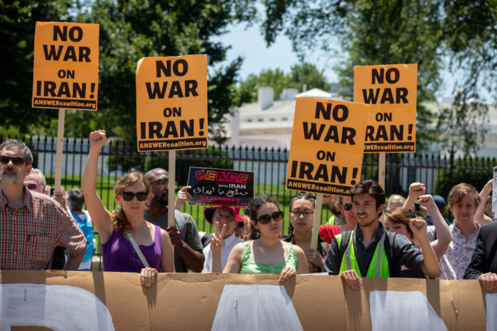 Activists Protest Possible War With Iran At White House