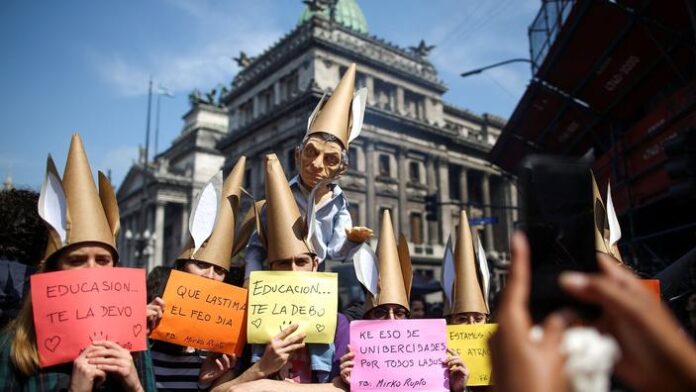 A demonstrator with a puppet of Argentine President Mauricio Macri during a national teachers' strike outside of the National Congress, in Buenos Aires